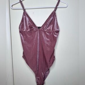 Pink body suit